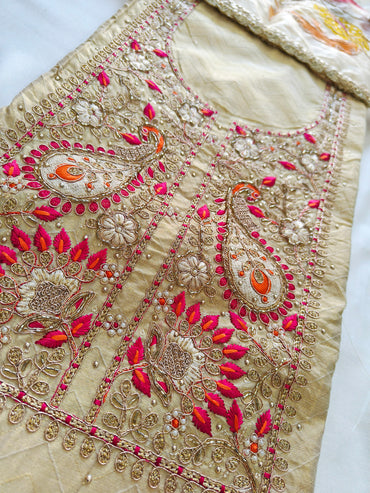 Banarasi Tissue Unstitched Suit Set with highlighted Dupatta Golden color